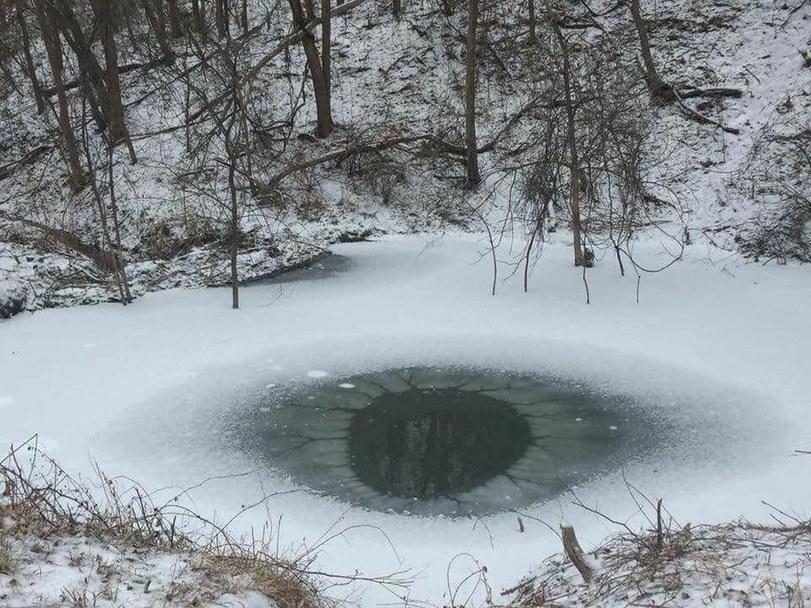 The ice in the pond, similar to the eye.
Translated by «Yandex.Translator»